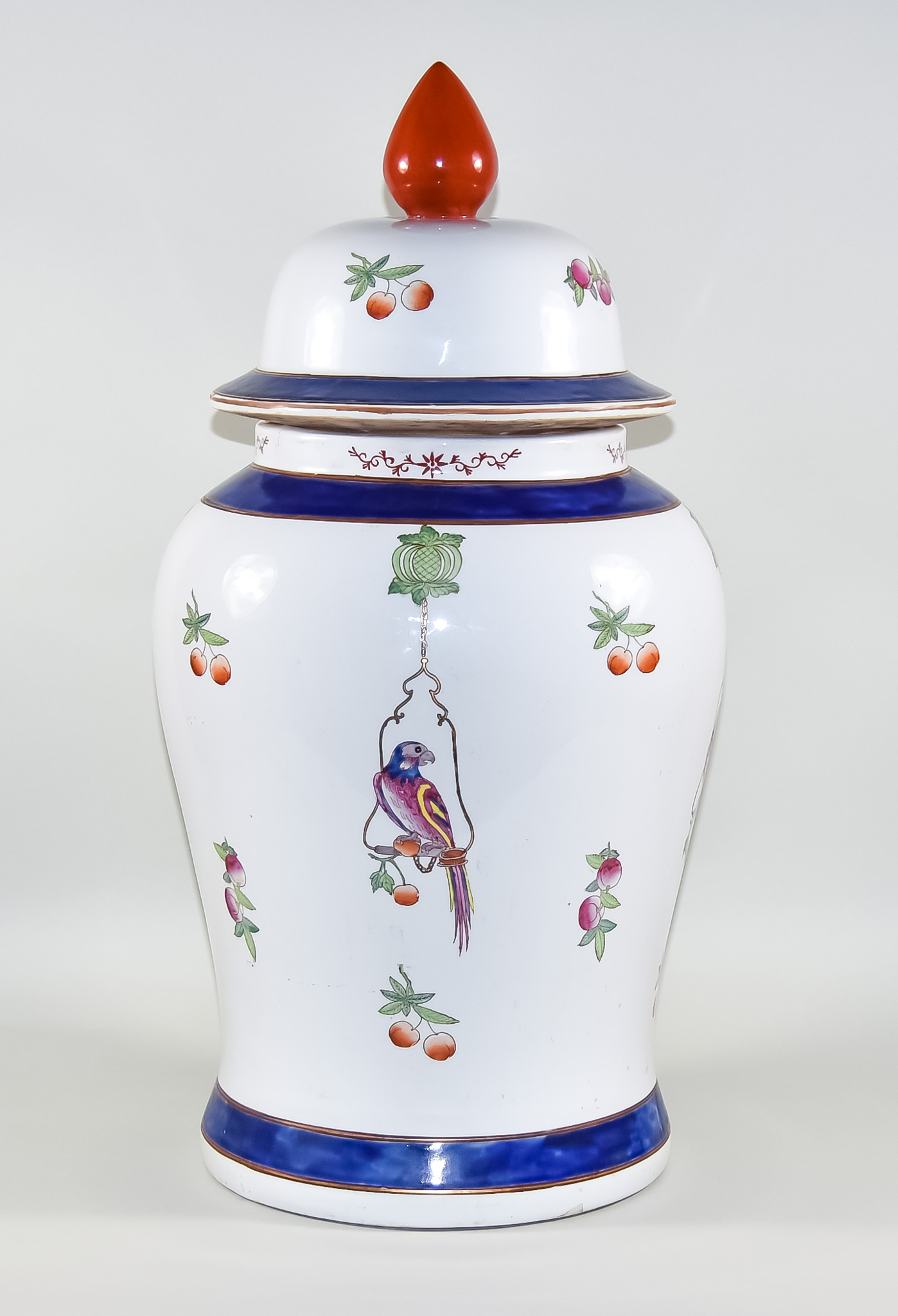 A Continental Porcelain Vase and Cover in the Chinese Manner and of Large Proportions, enamelled