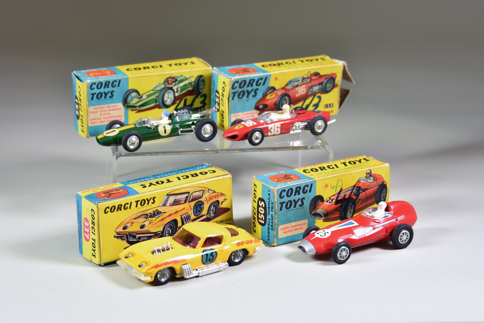 A Corgi Toys No. 1505 "Vanwall Formula 1 Grand Prix", No. 154 "Ferrari Formula 1 Grand Prix", No.