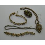 AN UNUSUAL VICTORIAN GILT METAL AND PASTE SET TEAR SHAPED PENDANT ON A BELCHER CHAIN NECKLACE;