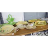 A collection of 1930s Crown Devon pottery, moulded with garden wall pattern with yellow, cream or