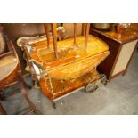 AN ITALIAN MARQUETRY TWO TIER COCKTAIL TROLLEY, HAVING FALL LEAVES