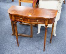 BEVAN FUNNELL LTD. 'REPRODUX' YEW WOOD SERPENTINE SMALL HALL TABLE, with short drawers, on four