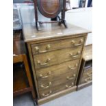 AN ELM CHEST OF FIVE LONG DRAWERS, THE FIVE DIAPER DRAWERS FITTED FOR CD STORAGE, BRASS DROP
