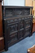 LATE 19th CENTURY/EARLY 20th CENTURY REPRODUCTION DARK STAINED PANELLED AND CARVED OAK COURT