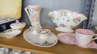 MALING, NEWCASTLE LUSTRE JUG VASE, EMBOSSED WITH PINK FLOWERING BRANCHES; A SIMILAR DRESSING TABLE