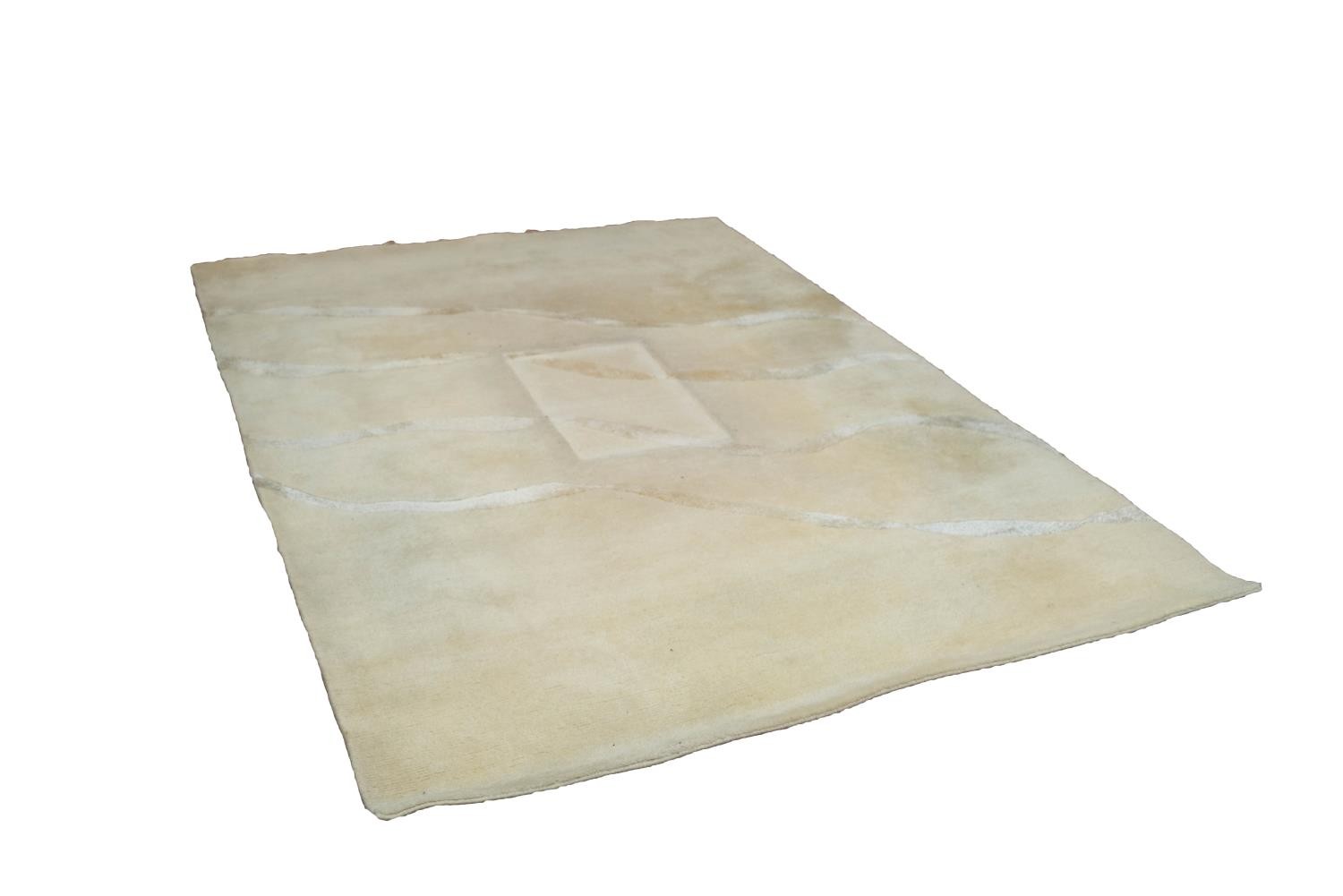 HEAVY QUALITY DEEP PILE CREAM WOOL CARPET, decorated with four white silk, twist ribbon pattern,