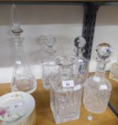 Five cut glass decanters