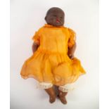 ARMAND MARSEILLE BISQUE HEADED BLACK BABY DOLL with brown glass eyes, open mouth and two lower