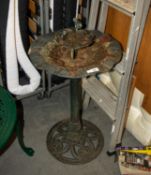 A METAL REPRODUCTION BIRD BATH WITH ORNATE BASE