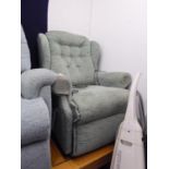 A LADY?S SHERBORNE ELECTRONICALLY ADJUSTABLE WINGED LOUNGE ARMCHAIR ENSUITE