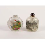 TWO CHINESE INSIDE PAINTED GLASS SNUFF BOTTLES, one of flattened form, painted with peacocks, the