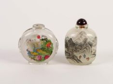 TWO CHINESE INSIDE PAINTED GLASS SNUFF BOTTLES, one of flattened form, painted with peacocks, the