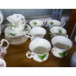 A SET OF SIX ROYAL ALBERT ?TRILLIUM? PATTERN CHINA COFFEE CUPS AND SAUCERS