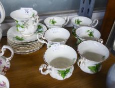 A SET OF SIX ROYAL ALBERT ?TRILLIUM? PATTERN CHINA COFFEE CUPS AND SAUCERS