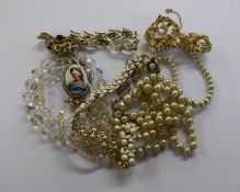 GILT METAL COSTUME BROOCH SET WITH A LIMOGES, FRENCH PORCELAIN OVAL PRINTED PORTRAIT MINIATURE OF