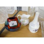 A Poole glazed abstract purse vase, 4? high, Gainsborough posy vase, 5 ¼? and Derby posies cream