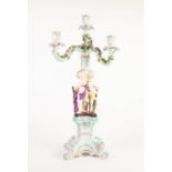 EARLY TWENTIETH CENTURY SITZENDORF, GERMAN FLORAL ENCRUSTED PORCELAIN FIGURAL FOUR LIGHT CANDELABRA,