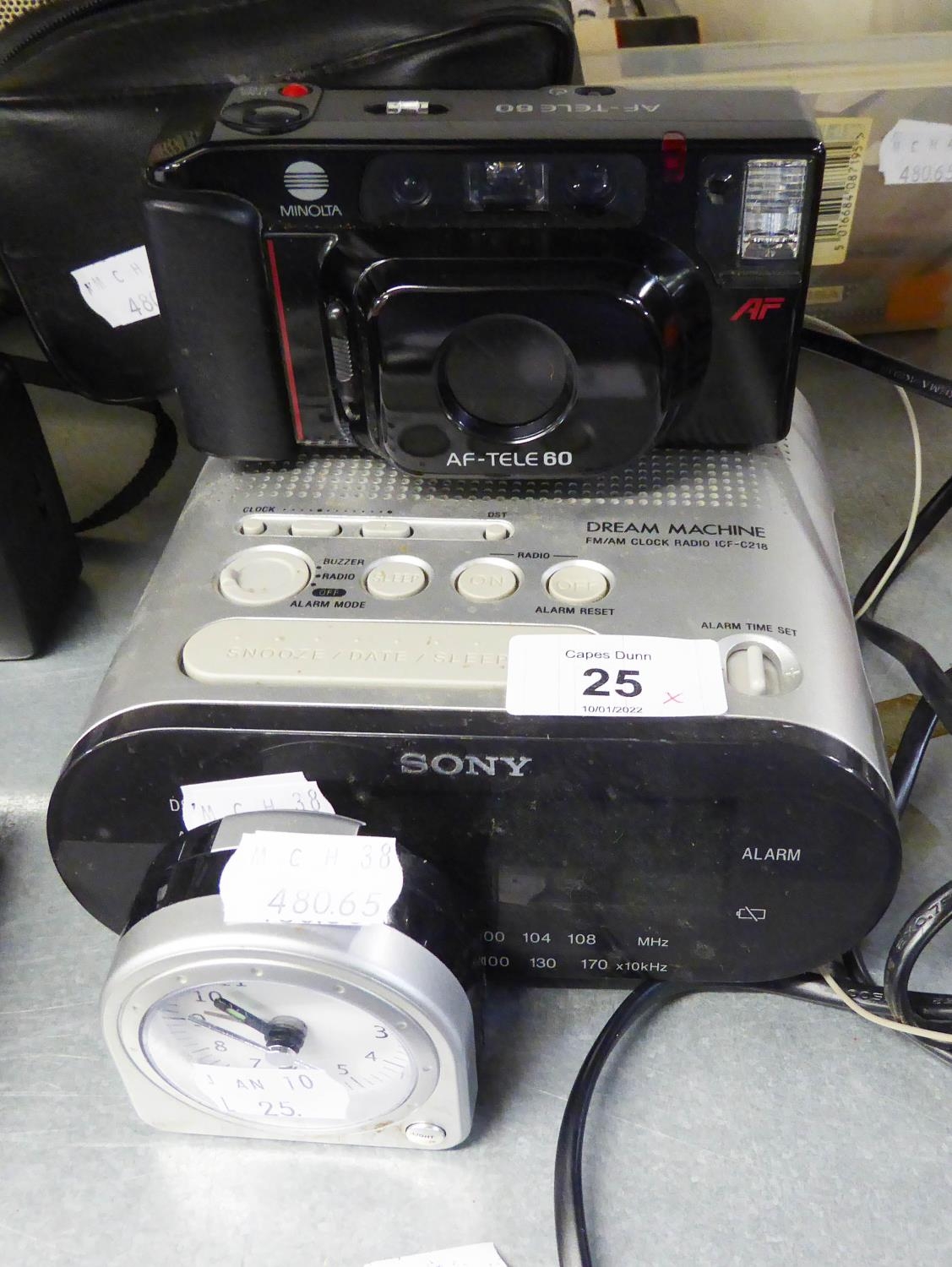 MINOLTA AF TELE60 roll film camera , in case and a SONY bedside clock/radio and a small clock