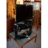 PANASONIC VIERA 31? FLAT SCREEN TELEVISION, ON BLACK GLASS THREE TIER STAND, WITH PANASONIC DVD