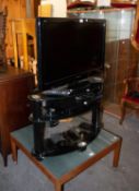 PANASONIC VIERA 31? FLAT SCREEN TELEVISION, ON BLACK GLASS THREE TIER STAND, WITH PANASONIC DVD