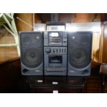 PROLINE LARGE PORTABLE RADIO/CD/CASSETTE TAPE PLAYER, WITH END LOUDSPEAKERS
