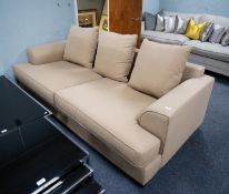 PAIR OF THREE SEATER SETTEES,  covered in plain fawn fabric, each having a low back, rectangular
