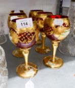SET OF 6 VENETIAN RUBY AND GILT TALL HOCK GLASSES, ENCRUSTED WITH CERAMIC FLOWERS, ON SPIRALLY