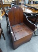 NINETEENTH CENTURY PITCH PINE COMMODE ARMCHAIR, with lift-up seat