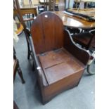 NINETEENTH CENTURY PITCH PINE COMMODE ARMCHAIR, with lift-up seat