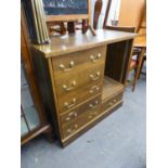 A CUSTOM MADE ELM CD STORAGE CABINET WITH A NEST OF SIX FITTED DRAWERS WITH BRASS DROP HANDLES, NEXT