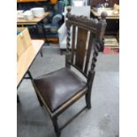 A SET OF FOUR OAK DINING CHAIRS, WITH CARVED FLOWER DECORATION TO CENTRAL SPLAT BACK, RAISED ON