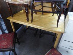 A BLOND BEECH WOOD OBLONG KITCHEN TABLE AND A BUTLERS TRAY WITH FOLDING STAND  (2)