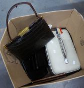 A LADY?S FRENCH CROCODILE SKIN HANDBAG, TWO OTHER HANDBAGS AND A VANITY CASE