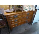 EDWARDIAN WALNUT BEDROOM CHEST OF TWO SHORT AND TWO LONG DRAWERS, ON TURNED TAPERING LEGS WITH BRASS