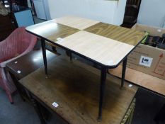 1960?S FORMICA TOPPED COFFEE TABLE, ON TV LEGS; A GILT FRAMED BEVELLED EDGE OBLONG WALL MIRROR (2)