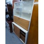 A WHITE PAINTED WOOD KITCHENETTE