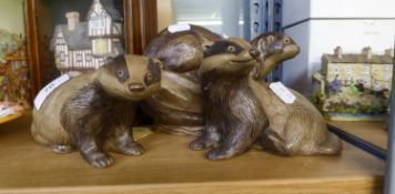 THREE BARBARA LINLEY ADAMS POTTERY MODELS OF OTTERS  (3)