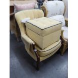 A MODERN ALL-UPHOLSTERED FIRESIDE ARMCHAIR AND SQUARE BOX STOOL ENSUITE, COVERED IN BUTTONED BEIGE