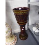 A BROWN GLAZED POTTERY JARDINIERE, ON LOW PEDESTAL STAND