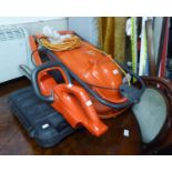 A FLYMO HOVER VAC 280 LAWN MOWER, A FLYMO EASICUT CORDLESS 420 (LACKS BATTERY) AND A BLACK AND