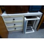 A WHITE MELAMINE SINGLE PEDESTAL DRESSING TABLE WITH THREE DRAWERS AND CIRCULAR PEDESTAL MIRROR