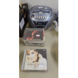 TEVION MAINS ELECTRIC PORTABLE RADIO/CD PLAYER AND SOME CD'S