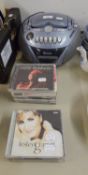 TEVION MAINS ELECTRIC PORTABLE RADIO/CD PLAYER AND SOME CD'S