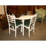 A WHITE FINISH CIRCULAR KITCHEN TABLE AND A SET OF FOUR LADDER BACK SINGLE CHAIRS