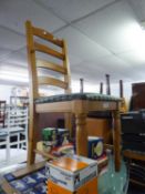 A PAIR OF PINE LADDER BACK KITCHEN CHAIRS, HAVING PADDED SEATS (2)