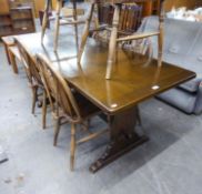 AN OBLONG OAK REFECTORY DINING TABLE, 167cm long x 76cm wide AND A SET OF SIX OAK WHEEL BACK