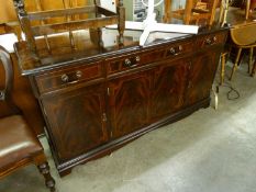 GEORGIAN STYLE MAHOGANY SIDEBOARD WITH THREE FRIEZE DRAWERS AND THREE CUPBOARDS BELOW