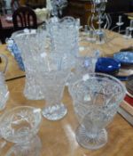 A LARGE GOOD QUALITY CUT GLASS VASE (CHIP TO BASE), ANOTHER LARGE CUT GLASS VASE (A.F.) AND THREE