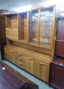 A TEAK EFFECT TALL AND WIDE SIDEBOARD WITH SUPERSTRUCTURE DISPLAY UNIT