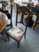 A SET OF FOUR EDWARDIAN CARVED MAHOGANY SINGLE CHAIRS, WITH PIERCED SPLAT BACKS